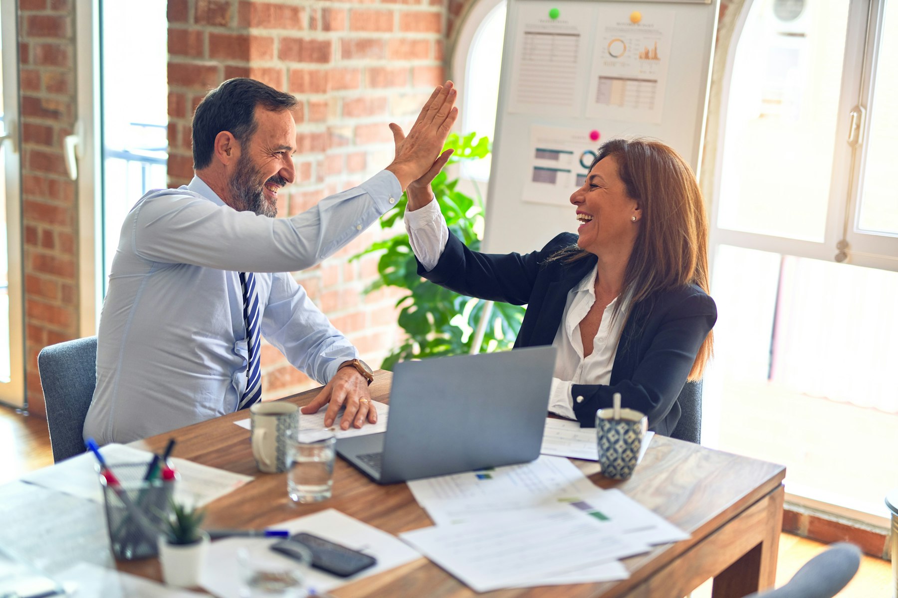 Business leaders in a focused working conversation